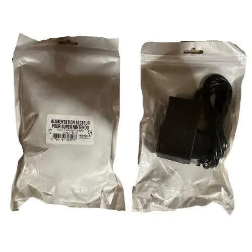 Freaks And Geeks - Super Nintendo AC adapter (in freaks and geeks bags + labels) - Erbjudande